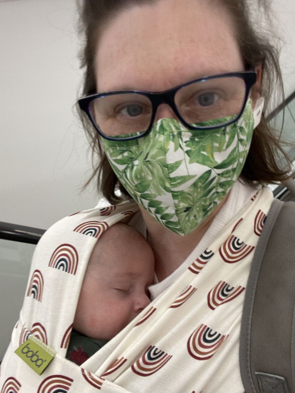 Woman carrying baby in a Boba wrap